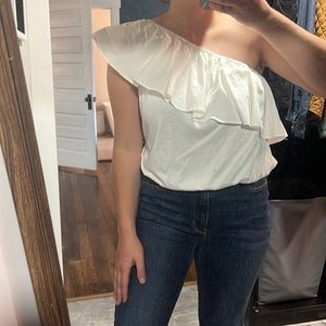 One shoulder white top
